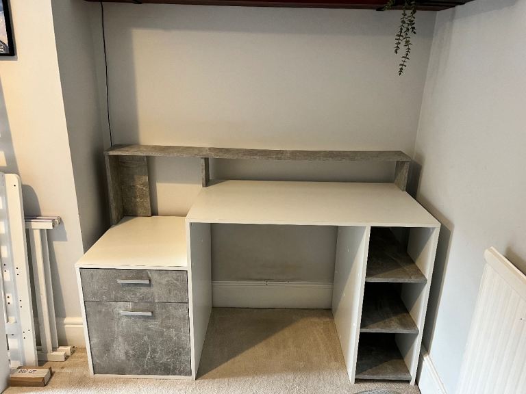 Desk with integrated bedside table/printer space