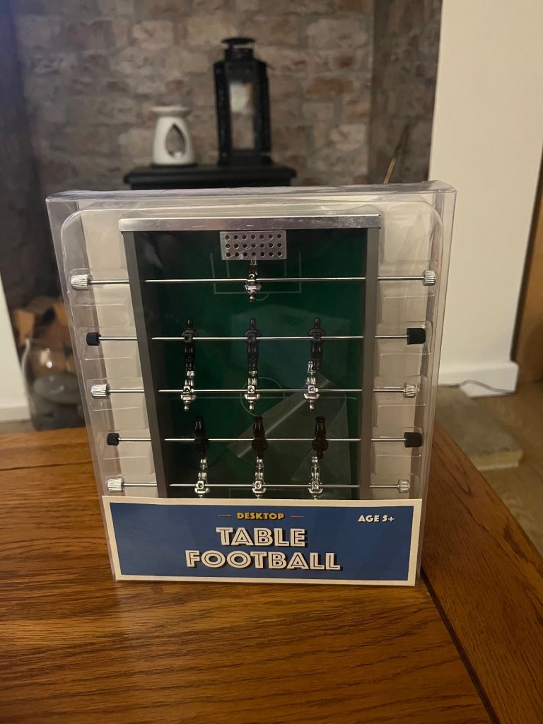 Hover ball and small desk top football table.