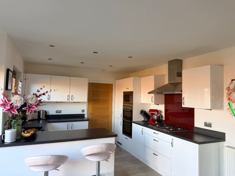 Kitchen and utility cabinets plus white goods, dishwasher, microwave, etc  
