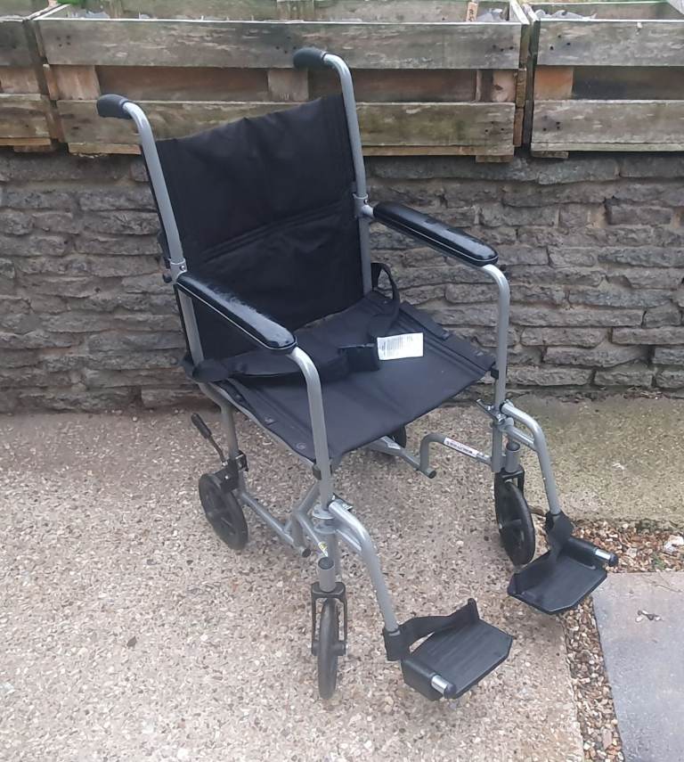 Attendant propelled wheelchair/ travel chair