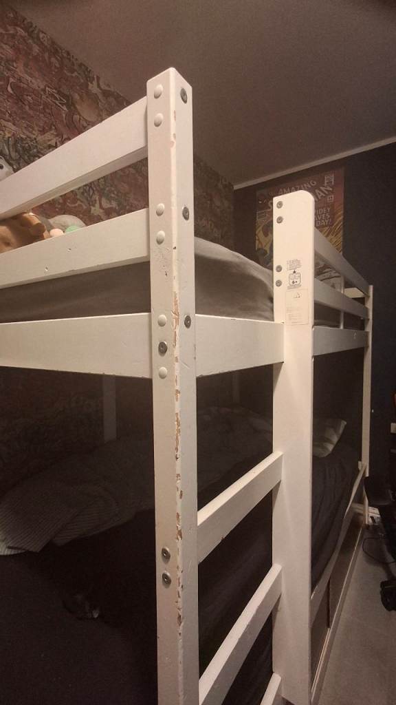 Bunks bed white with mattresses and storage 