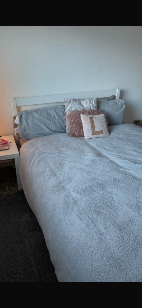 White wooden double bed frame