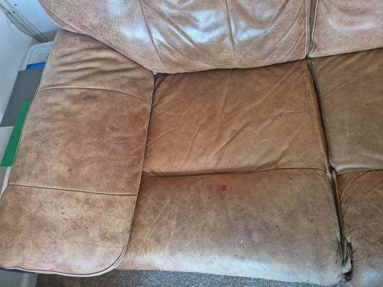 Free brown leather sofa and chair