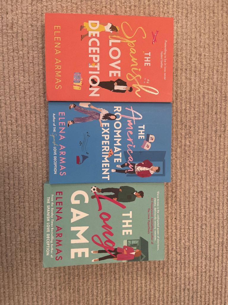 Reading books by Elena Armas