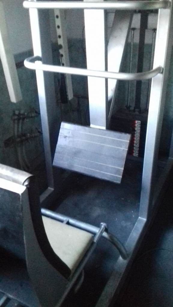 Weighted leg press - stack. 