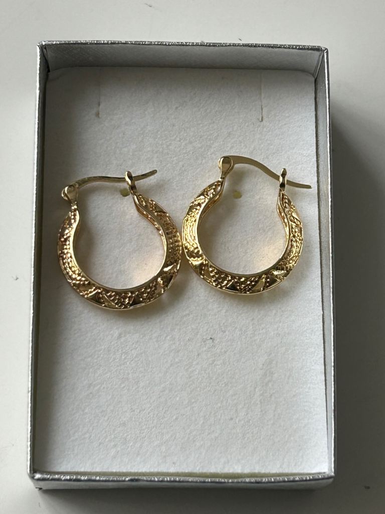 Earrings. Rose gold. James Warren.