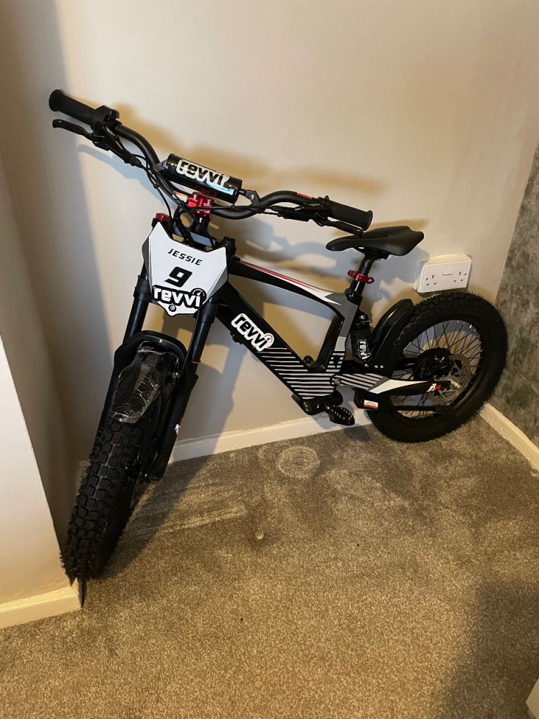Revvi 18 kids electric bike. 