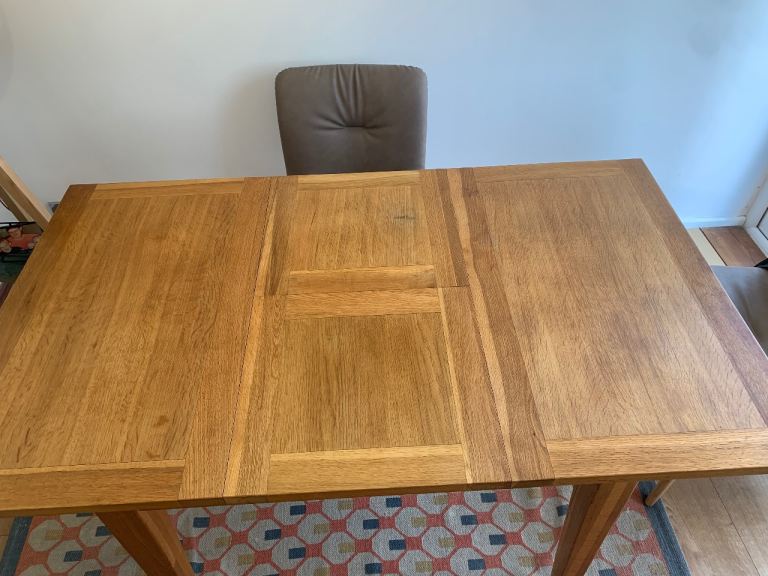 Solid Wood Extendable Dining Table – Good Condition