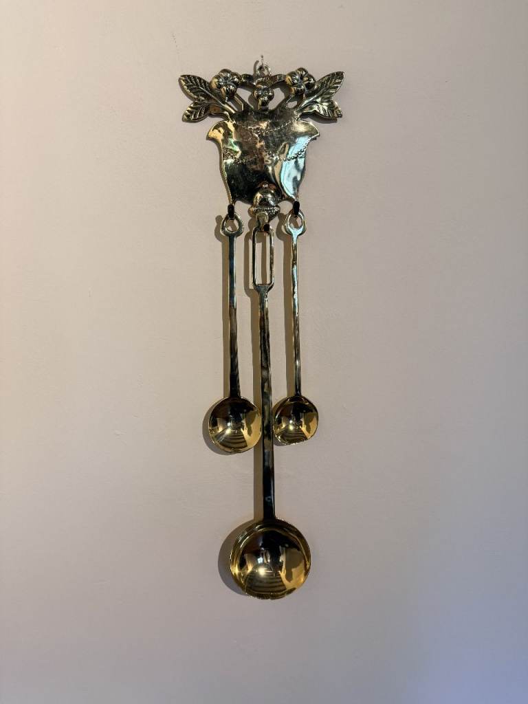 Brass spoons & hanging rack.