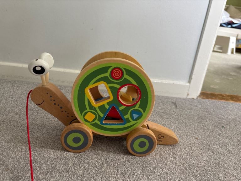 Hape Wooden Snail Pull Along Shape Sorter Toy