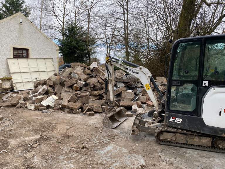 Mini digger hire with operator 