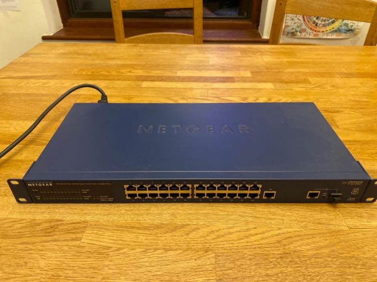 NETGEAR 24 Port Smart Fast Ethernet Switch CAN DELIVER