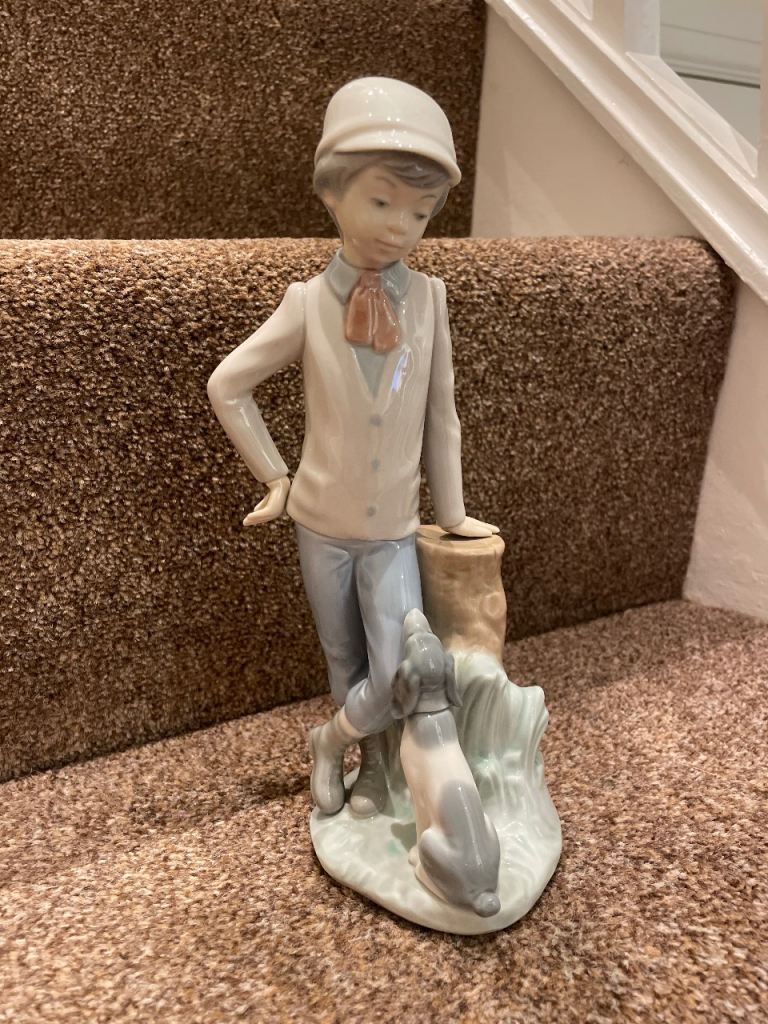NAO by Lladro figure boy with his dog 