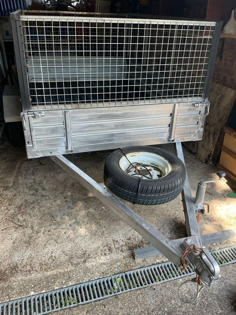 Seven by five full caged trailer with brand new tyres and wheels plus new spare,
