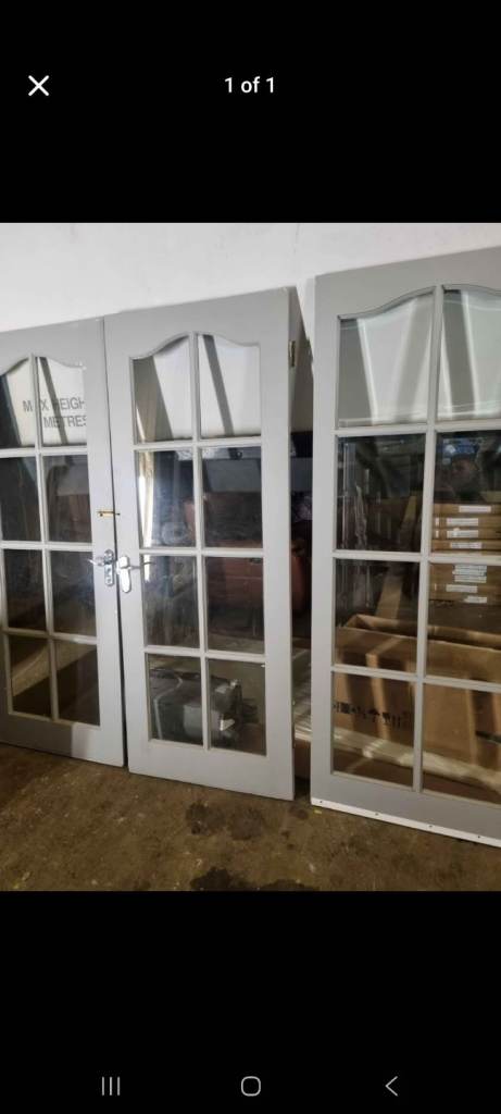 Set of glazed heavy wood doors