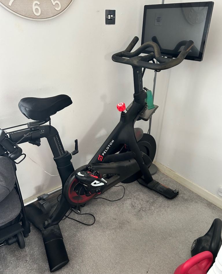 Peloton Bike with Accessories – Very Good Condition