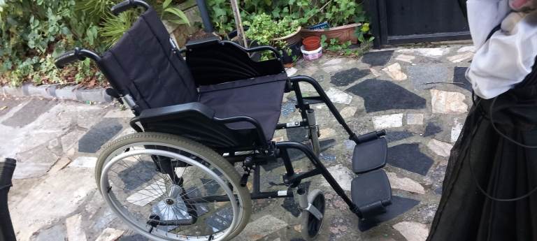 Folding Black Wheelchair - Good Condition, Ready to Use