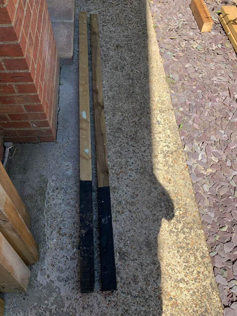 Two 75mm x 75mm x 2.4m fence posts