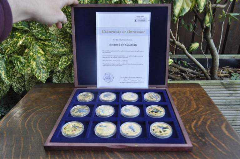 History of Aviation, 12 coins, in display case