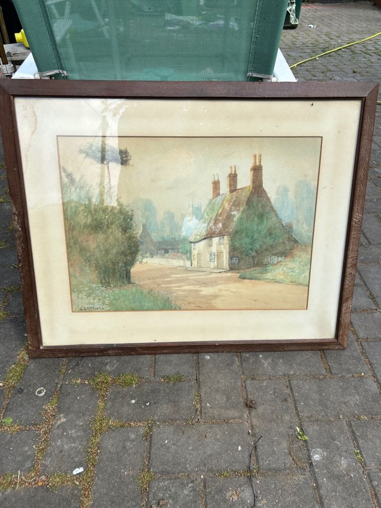 Framed watercolour of a cottage