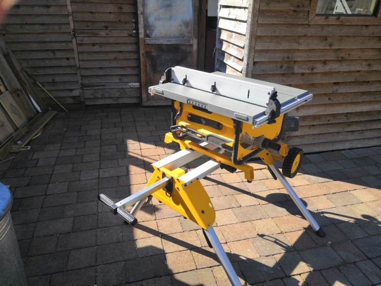 DeWalt contractor saw and mobile stand