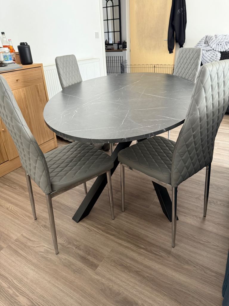 Marble effect dining table and chairs
