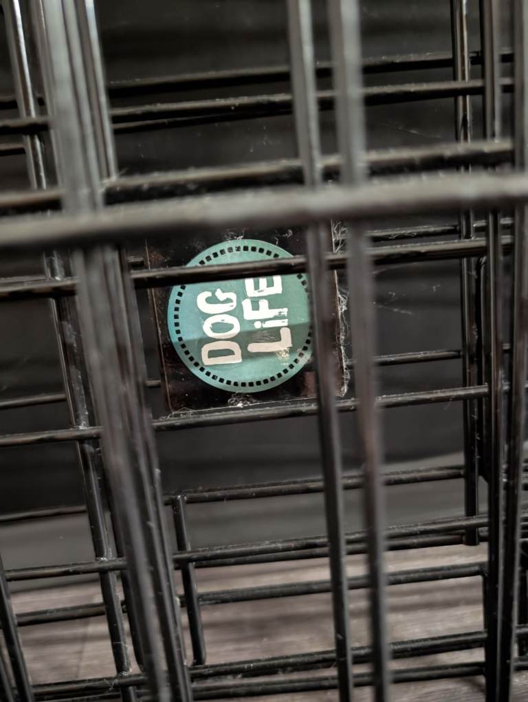 Black metal dog crate