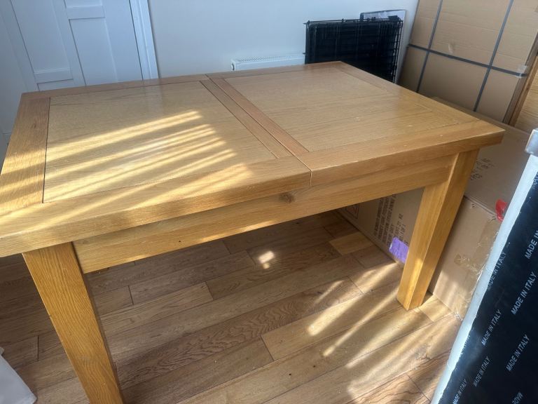 Solid Wood Extendable Dining Table – Good Condition
