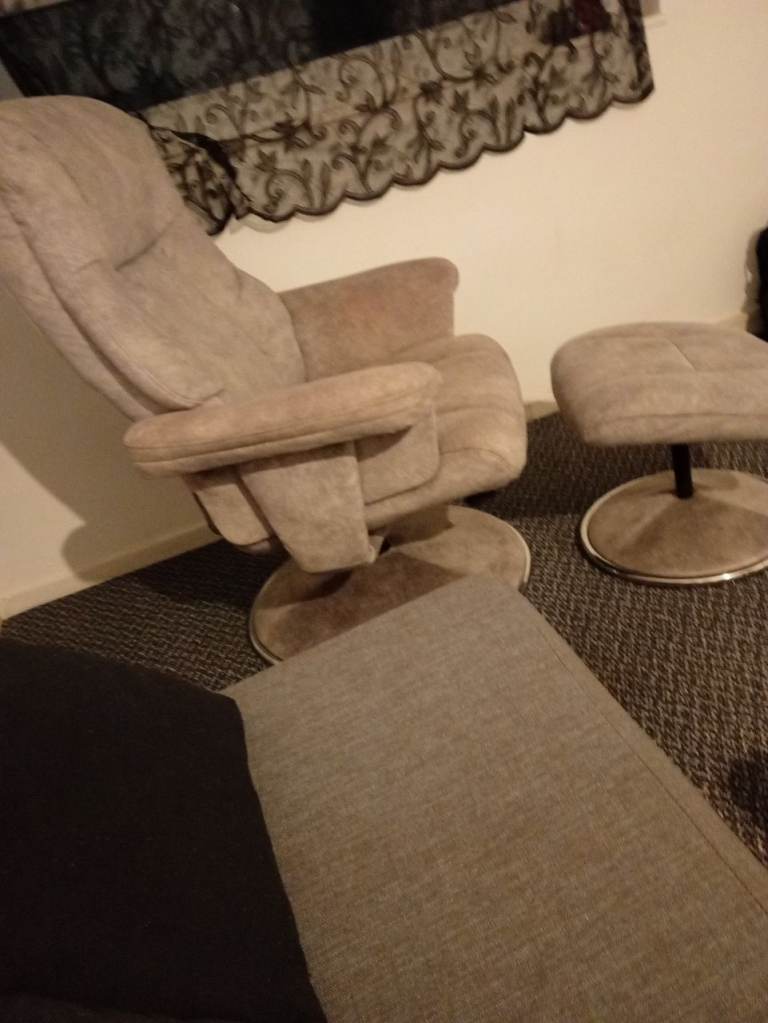 Modern suede armchair with poof