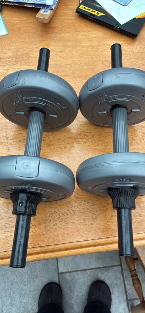 Two hand held dumb bells
