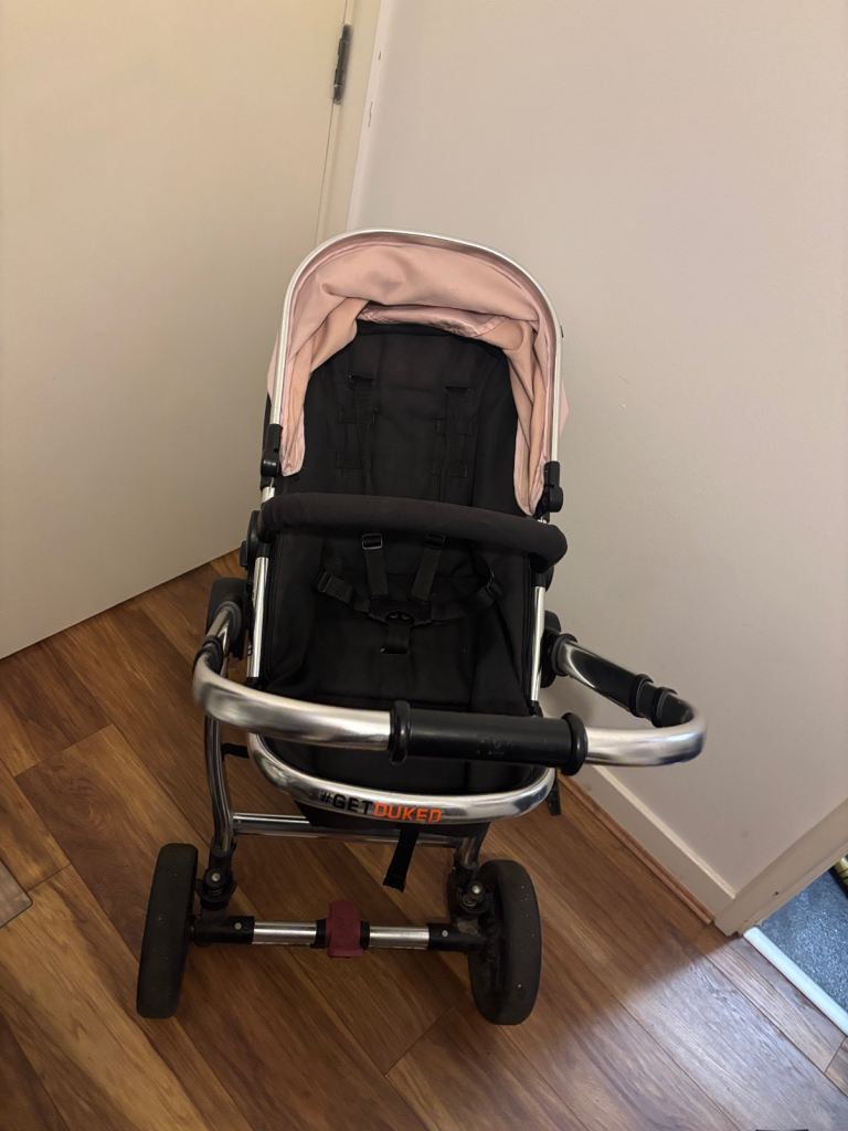 Mothercare Journey travel system in a blush pink color 