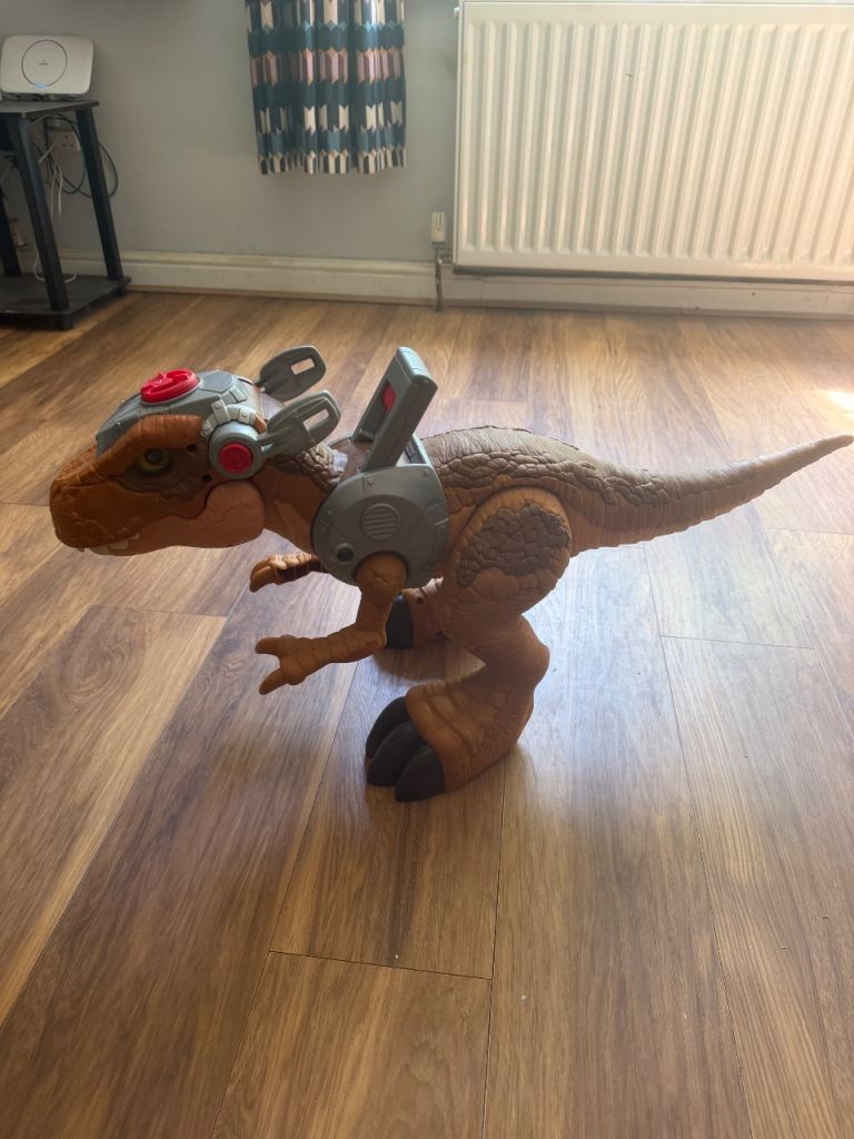 Large Dinosaur Toy with Robotic Gear – Good Condition