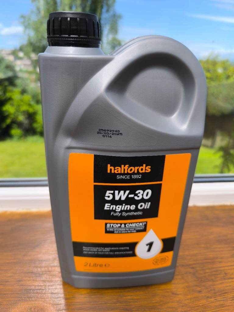 5W-30 Engine oil, just over a litre