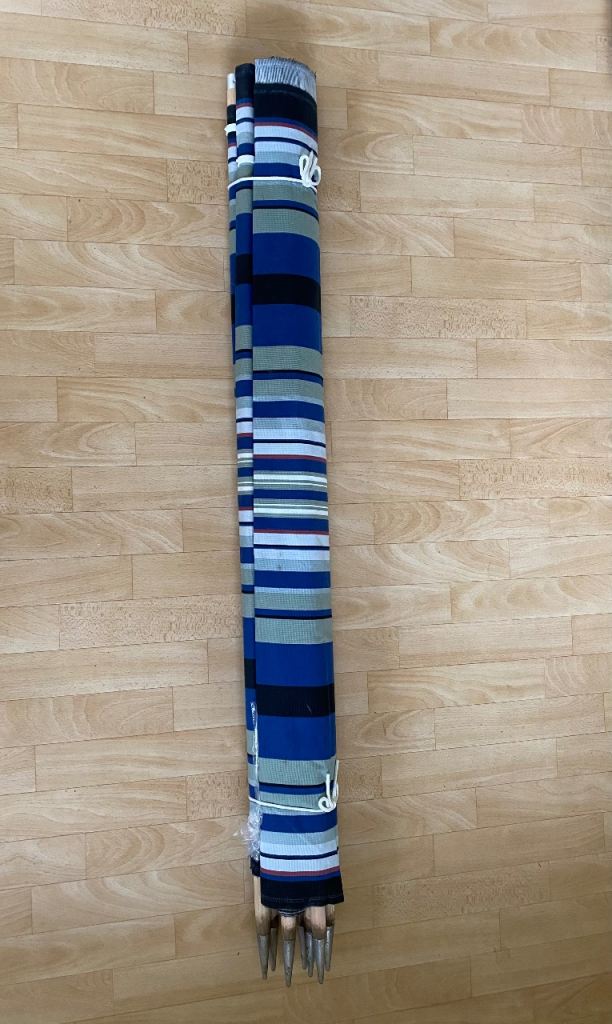 7 pole steel tipped windbreak, used once only