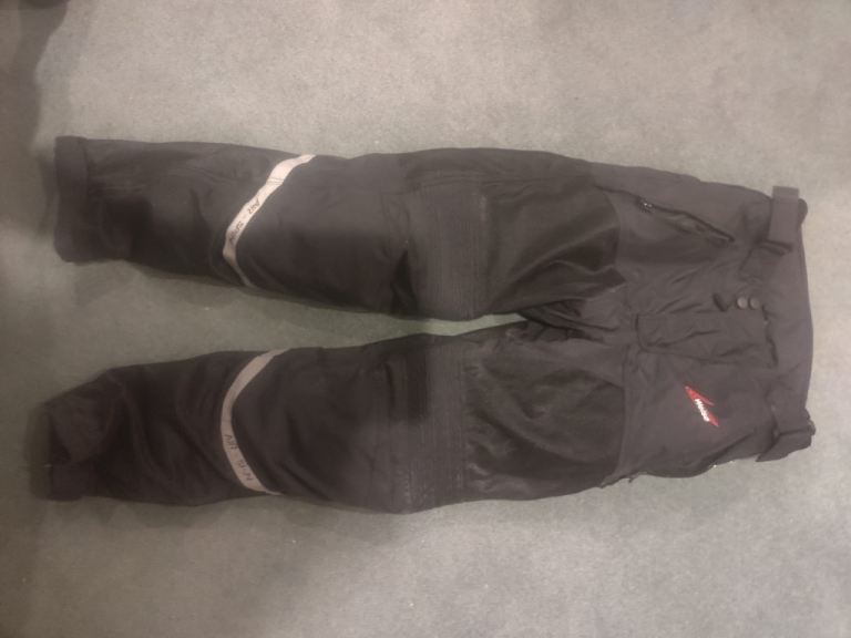 Motorcycle Helmet, Jacket and Trousers.