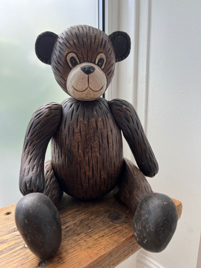 Beautiful antique solid wood bear