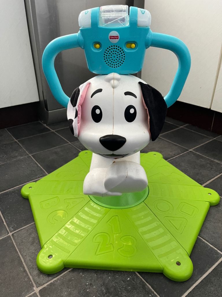 Fisher-Price Bounce and Spin Puppy, Stationary Musical Ride-On Toy