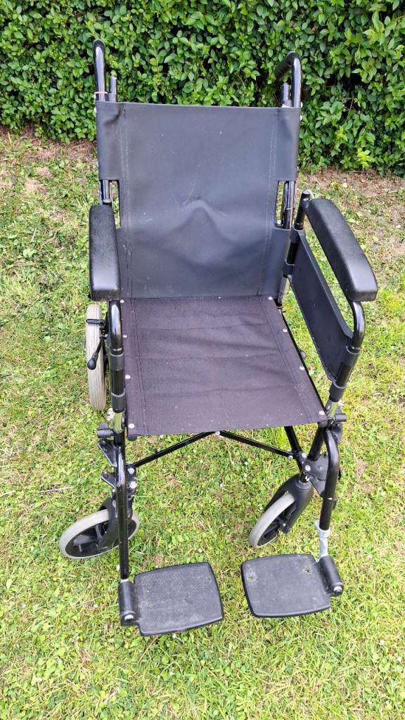 Wheelchair attendant-propelled 