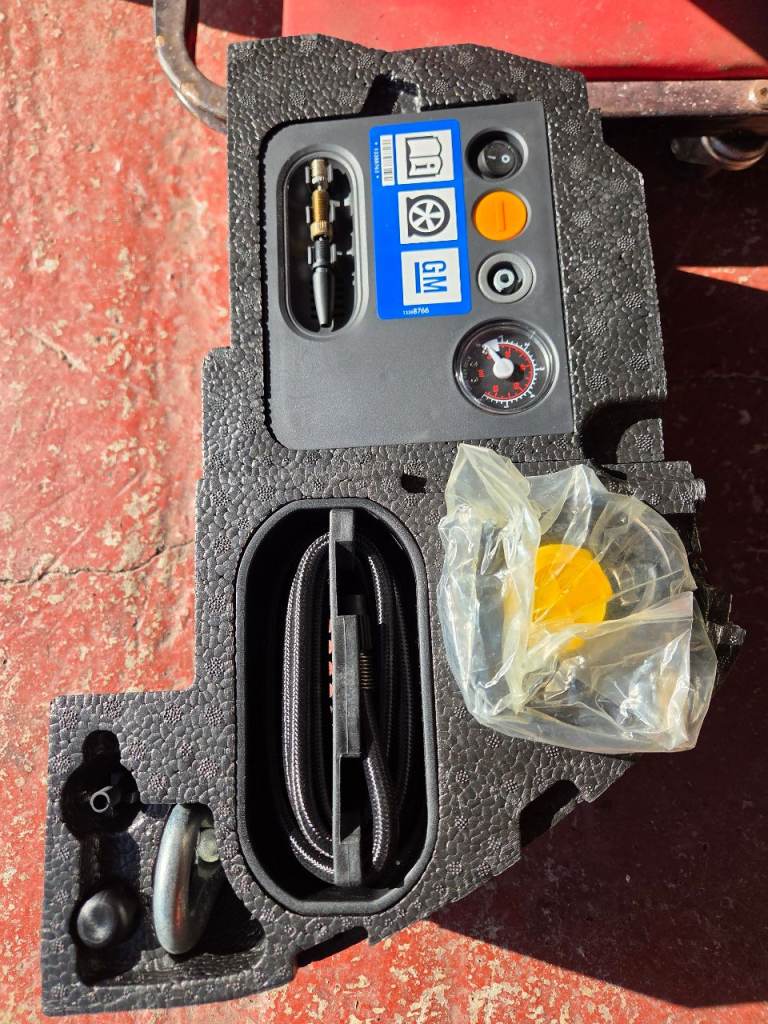 Vauxhall tyre inflation kit+towing eye