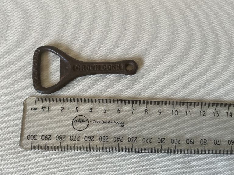 BOTTLE OPENER. ANTIQUE CROWN BOTTLE OPENER 