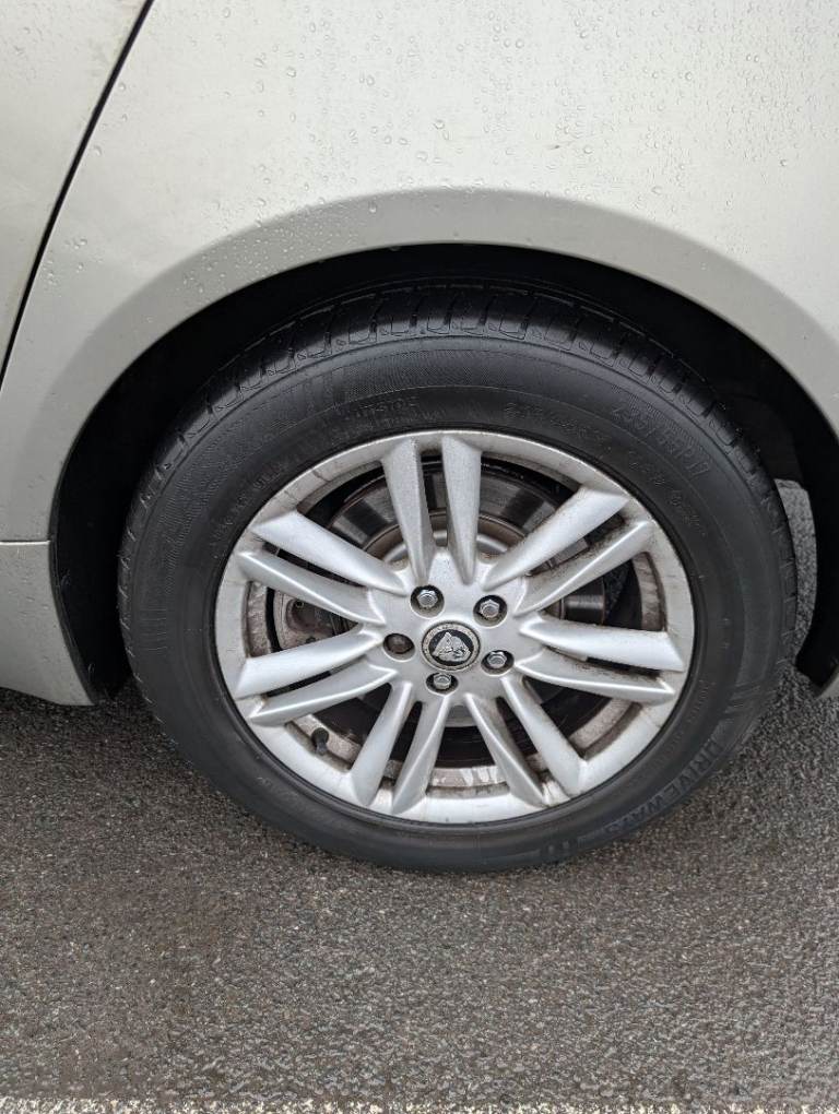 Four Jaguar xf alloys with tyres plenty tread 