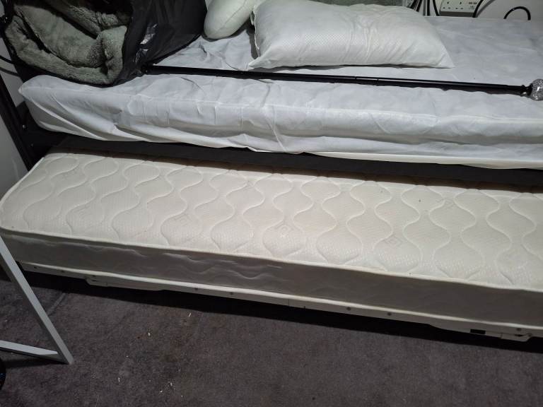 Single  bed with turddle bed as spare for a friend staying  over .