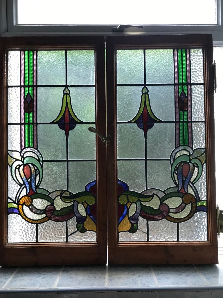 Antique stained glass windows pair 
