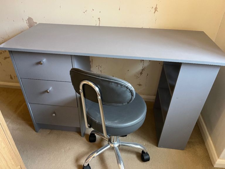 Grey desk and office chair 