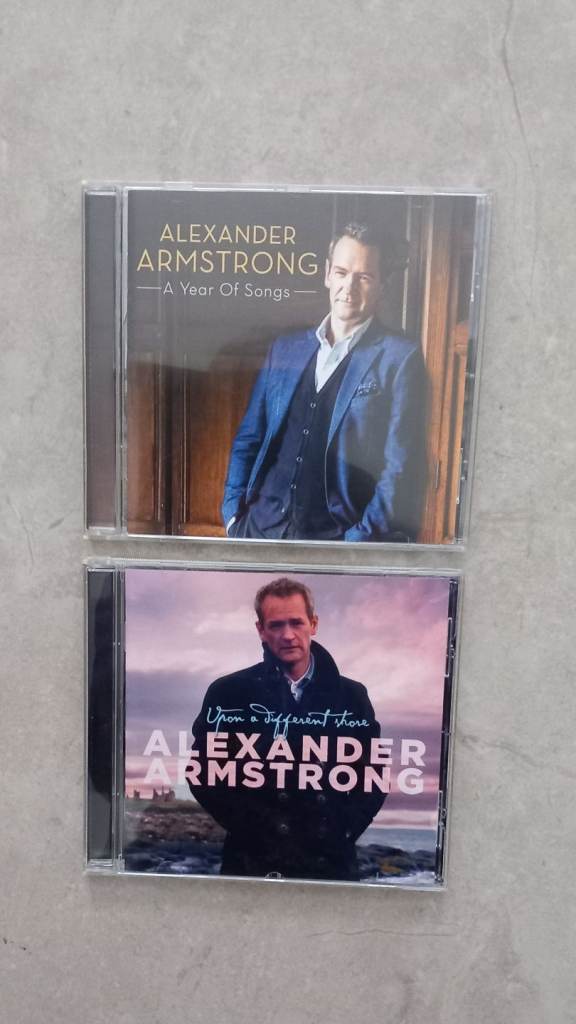 2 Alexander Armstrong Cds. 50p each. 