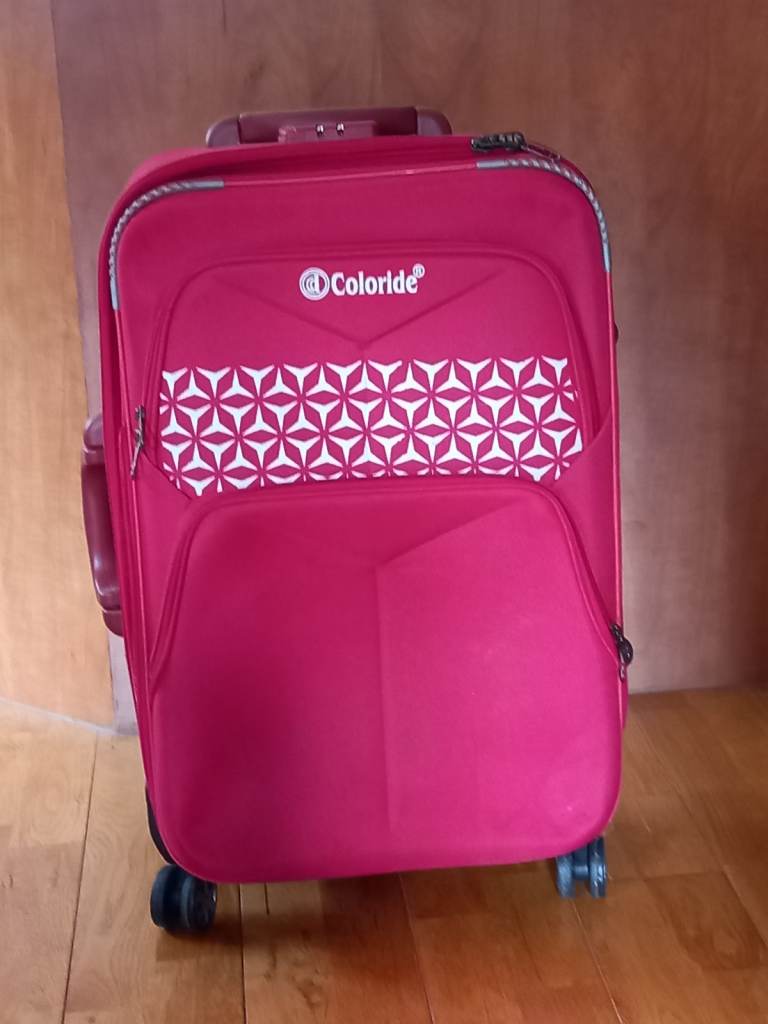 Used  Red and black Suitcases with Wheels – Good Condition