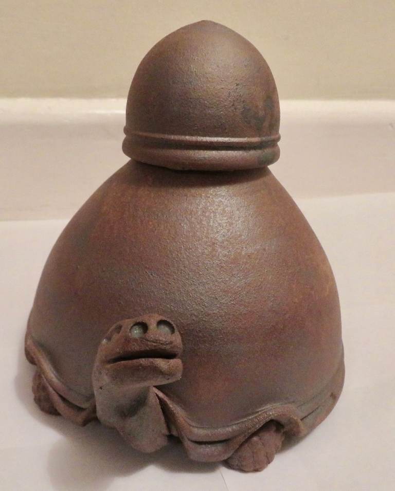 Handmade ceramic oil lamp in shape of a tortoise, with cover for wick. As new