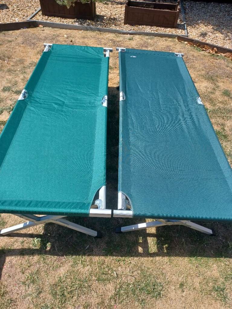 CAMPING BEDS X 2 FULL SIZE WITH CARRY BAGS.18 EACH OR 2 FOR 35.