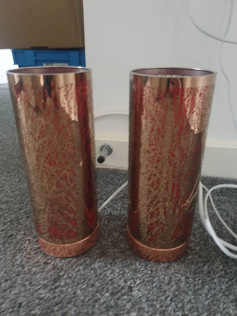 2 copper coloured touch lamps.