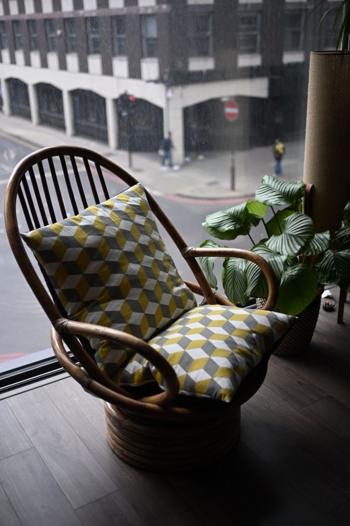 Vintage rattan swivel chair with cushions